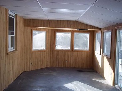 Other. Sunroom w/ stack for woodstove