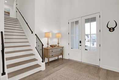 Bright and spacious foyer welcomes guests to your 