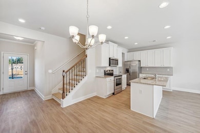 Kitchen with appliances with stainless steel finis