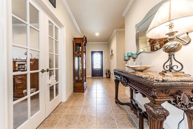 Office to to the left behind double French doors a