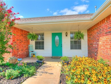 Welcoming covered front porch surrounded with beau