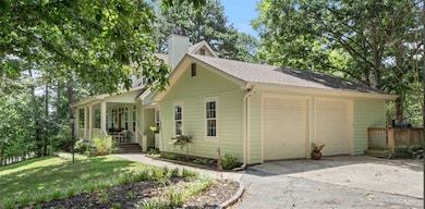 Double Car Garage with ample extra parking in driv