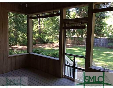 Porch. Enclosed screen back porch -- perfect for p