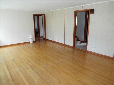 Living Room - Beautiful hardwood, drywall undernea