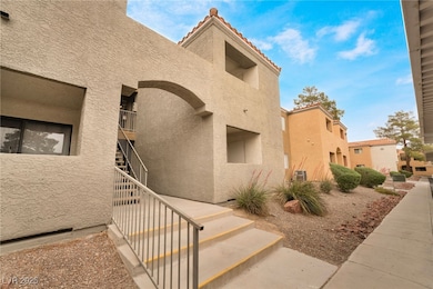 View of building exterior featuring stairway