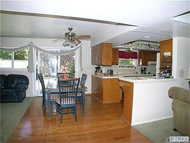 Enter this open floor plan onto hardwood floors