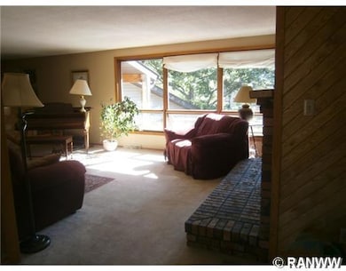 Living Room. Living Room fireplace boasts large he