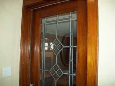 Foyer Living room entry door from foyer with close