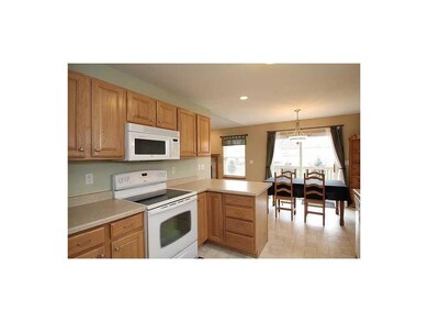 Kitchen. Kitchen with breakfast bar opens to dinin