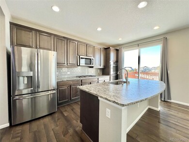 4825 S Versailles St, Aurora, CO 80015 - photo 5