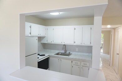 33 Windsor B, West Palm Beach, FL 33417 - photo 2