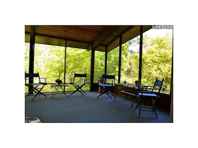 Very large screened-in porch off first floor famil