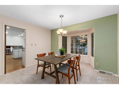 Dining room with bay window to backyard