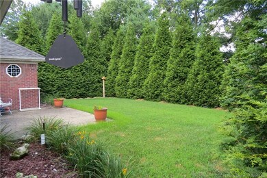 VIEW OF SECLUDED FENCED IN BACK YARD...