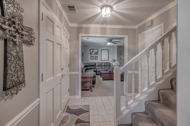 View from Entry Hall looking into Living Area. Til