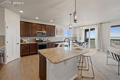 The large island adds even more counter space & ha