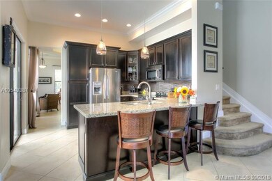 Kitchen w/ Wood Cabinets, Granite Counters, Stainl