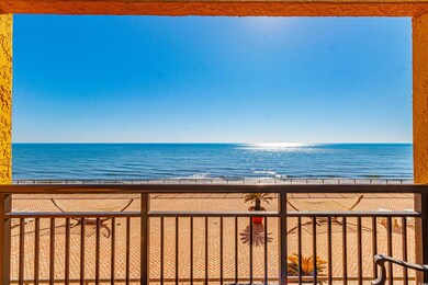 Property view of water with a beach view