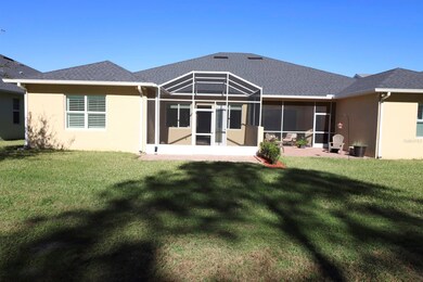 Back Exterior with Full Wrap Gutters & 2 Exterior Flood Lights