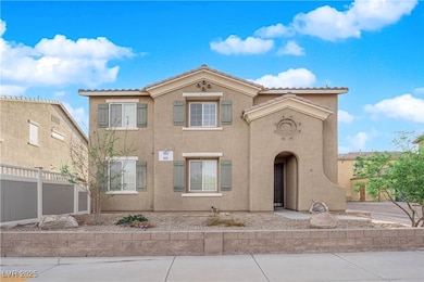 View of front of house with stucco siding, a tile