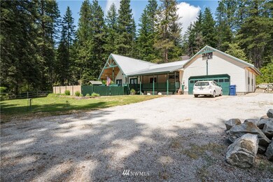 Welcome home to 2669 Sumac Lane at the base of the Cascade Mountains in Chiwawa River Pines.