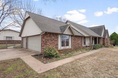 3-car attached garage with concrete driveway and c