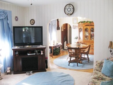 Living room has lots of light and is off the dinin