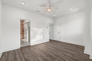 Second-floor primary bedroom with luxury vinyl flo