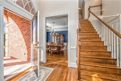 Inviting Foyer, leaded glass front door, lovely ha