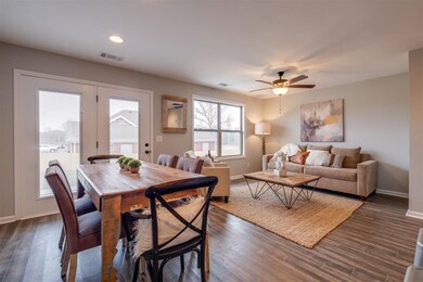 Dining room and living area.  French door to patio