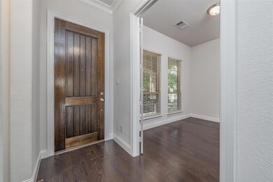 Foyer entrance featuring wood flooring