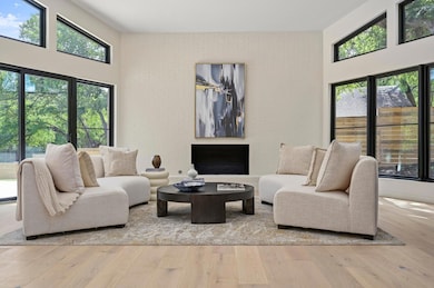 Living area featuring plenty of natural light, a 