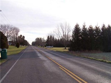 Land view down street east