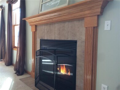 Detail of the easy-on gas fireplace, beautiful oak