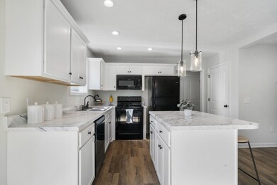 The kitchen is bright and spacious.