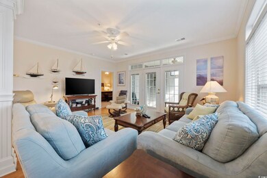 Living room with a wealth of natural light, crown 