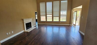 View of front of property featuring a garage and a