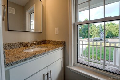 Bathroom with oversized vanity and mirror