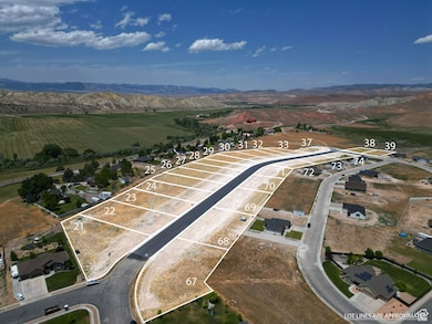 Aerial view of property's location featuring property boundaries highlighted and a mountainous background