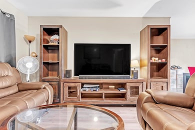 Living area featuring wood finished floors
