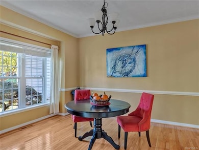 Dining Room - Hardwood Floors & Crown Molding