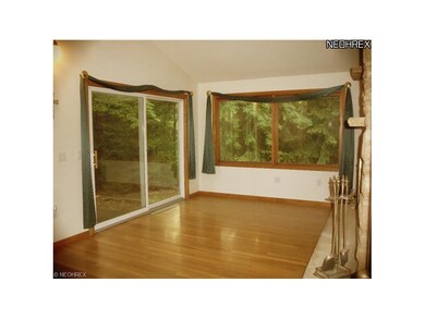 Family room off kitchen with sliders to patio