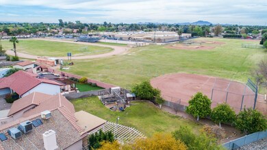 Sprawling back yard with homes behind