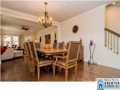 Spacious dining room with upgraded lighting and ha