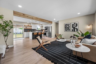 Open layout from living and kitchen is great for entertaining.