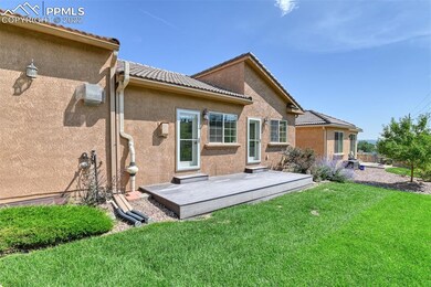 Backyard and entrances to living room and master b
