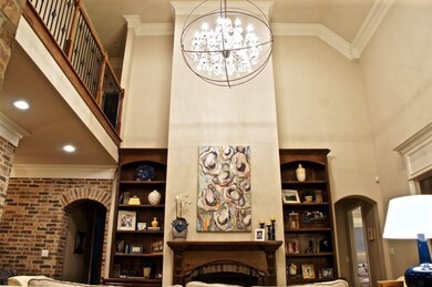Soaring ceiling with upstair balcony and elegant c