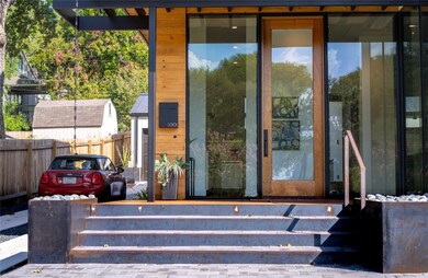 Property entrance featuring fence
