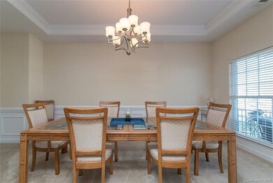 Spacious dining room is accented with decorative m