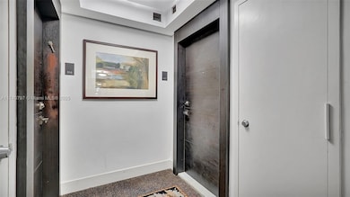 View of entry door from outside hall